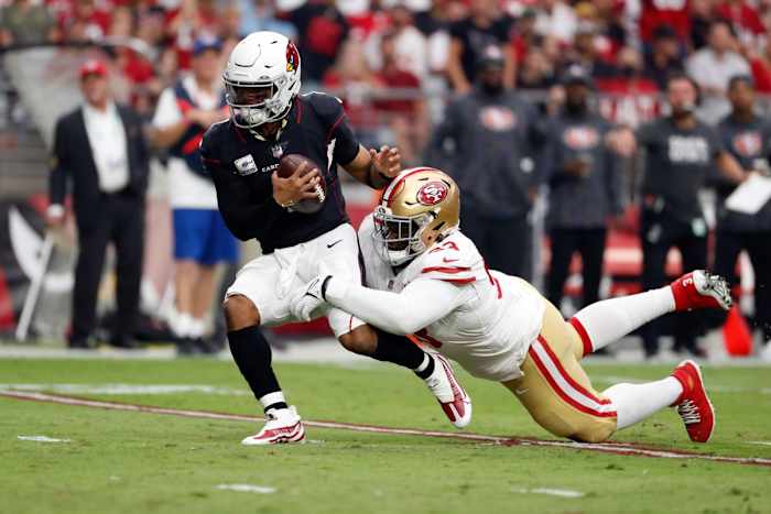 San Francisco 49ers defensive tackle D.J. Jones (93) tackles Arizona Cardinals quarterback Kyler Murray (1). Mandatory Credit: Chris Coduto-USA TODAY Sports